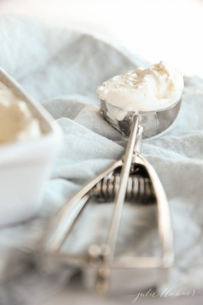 Close up of vanilla ice cream in an ice cream scoop