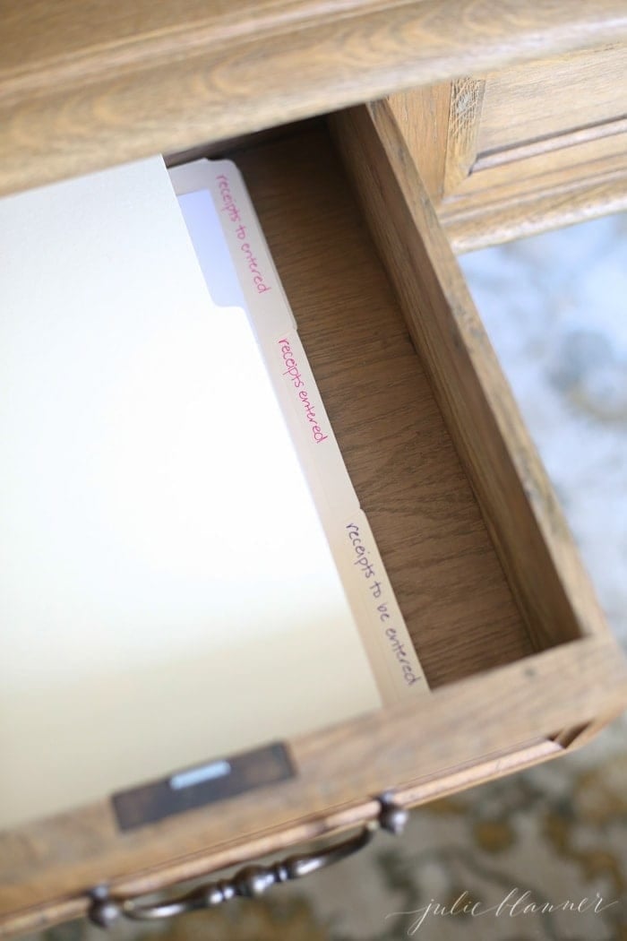 Files organized in a desk drawer and more home office organization ideas.