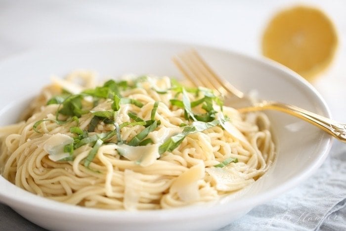 bowl of pasta with lemon and basil