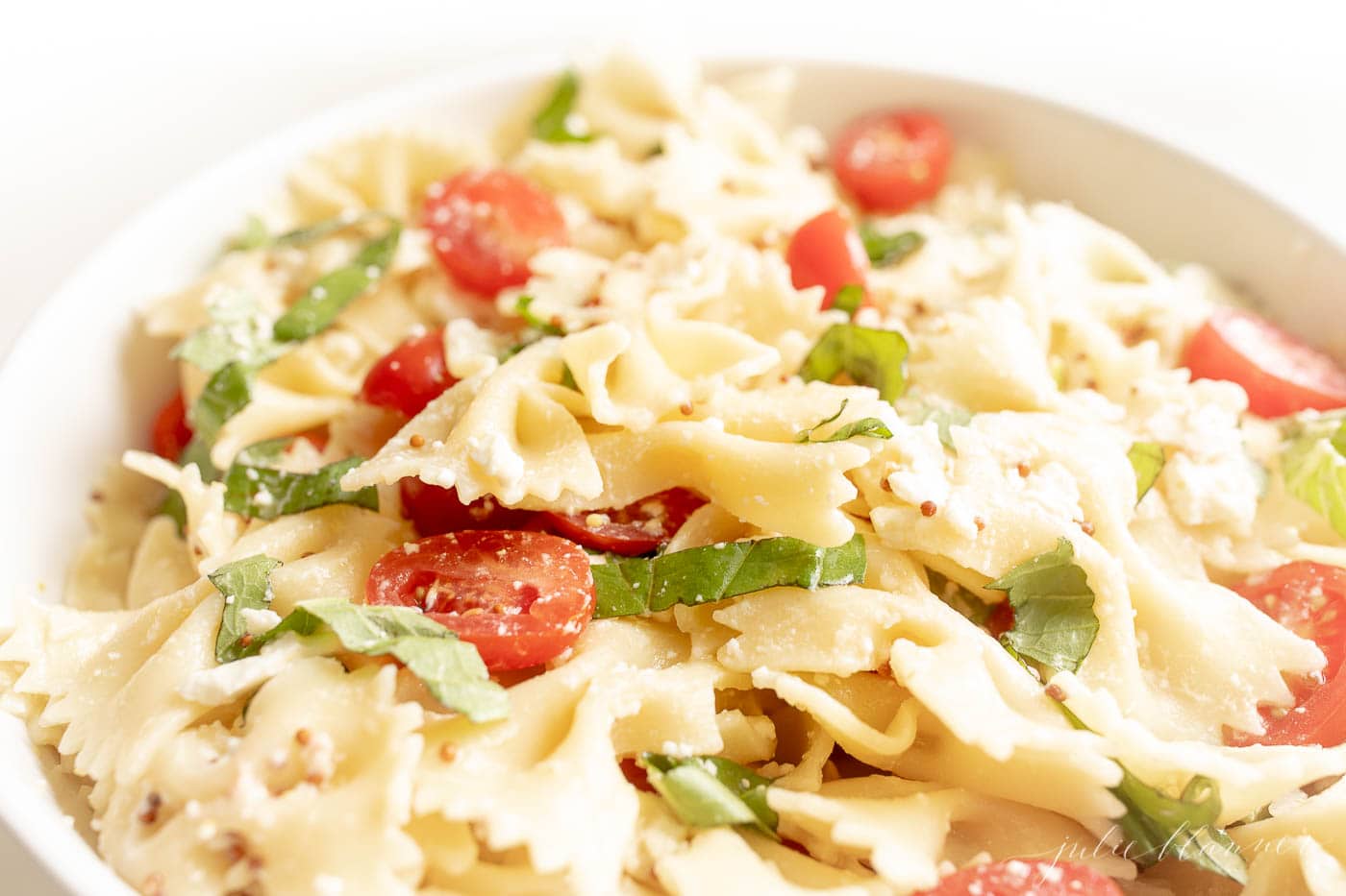 bow tie pasta salad with lemon vinaigrette basil and cherry tomatoes