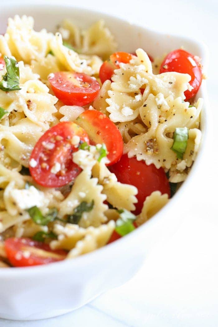 pasta salad dressing tossed with bow tie pasta