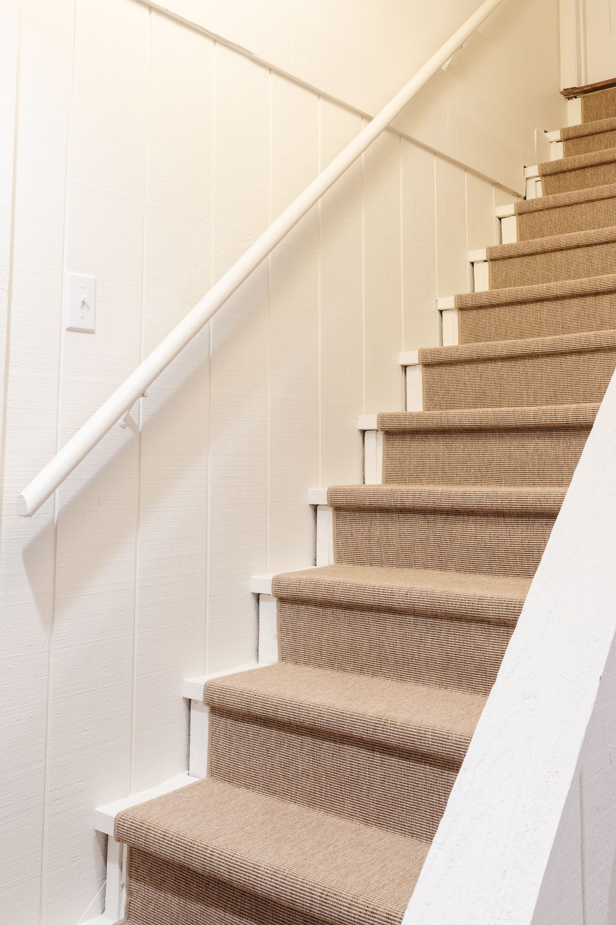 diy staircase makeover with a stair runner rug