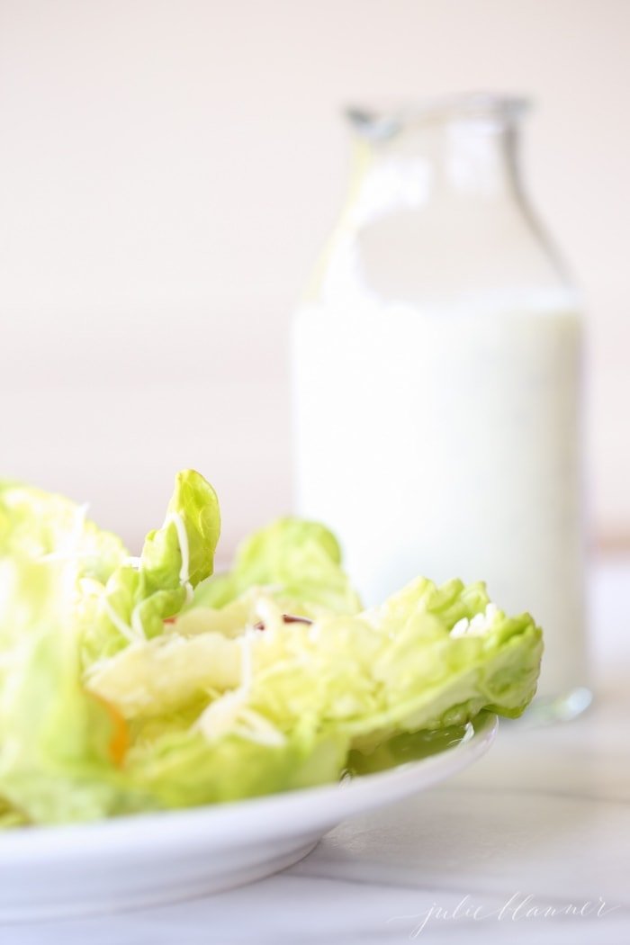 healthy ranch dressing drizzled on salad