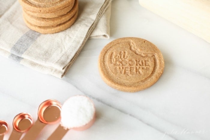 A cookie stamped with a fall cookie week logo