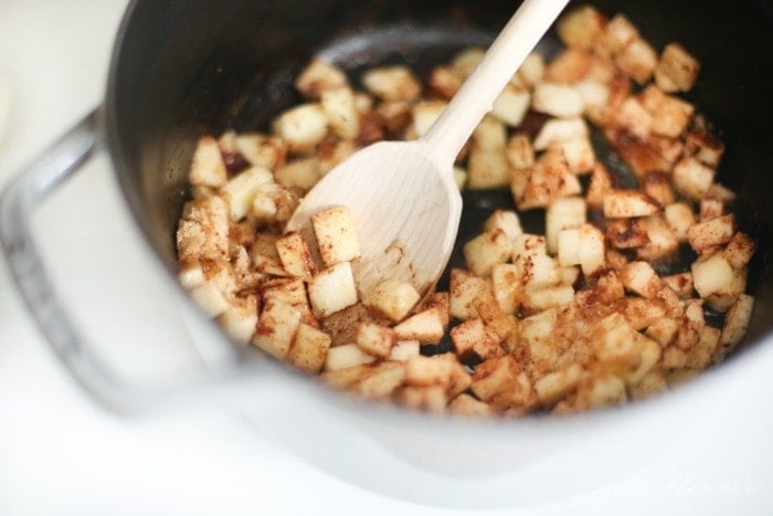 Apple chunks in a pan with spices
