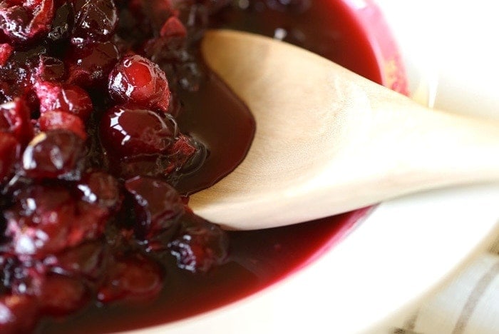 This is not your grandma's cranberry sauce - easy, 5 minute {hands on time} cranberry sauce recipe made with a secret ingredient!