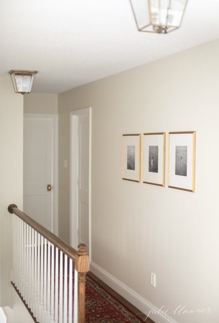 Lamp shades in a hallway by stairs