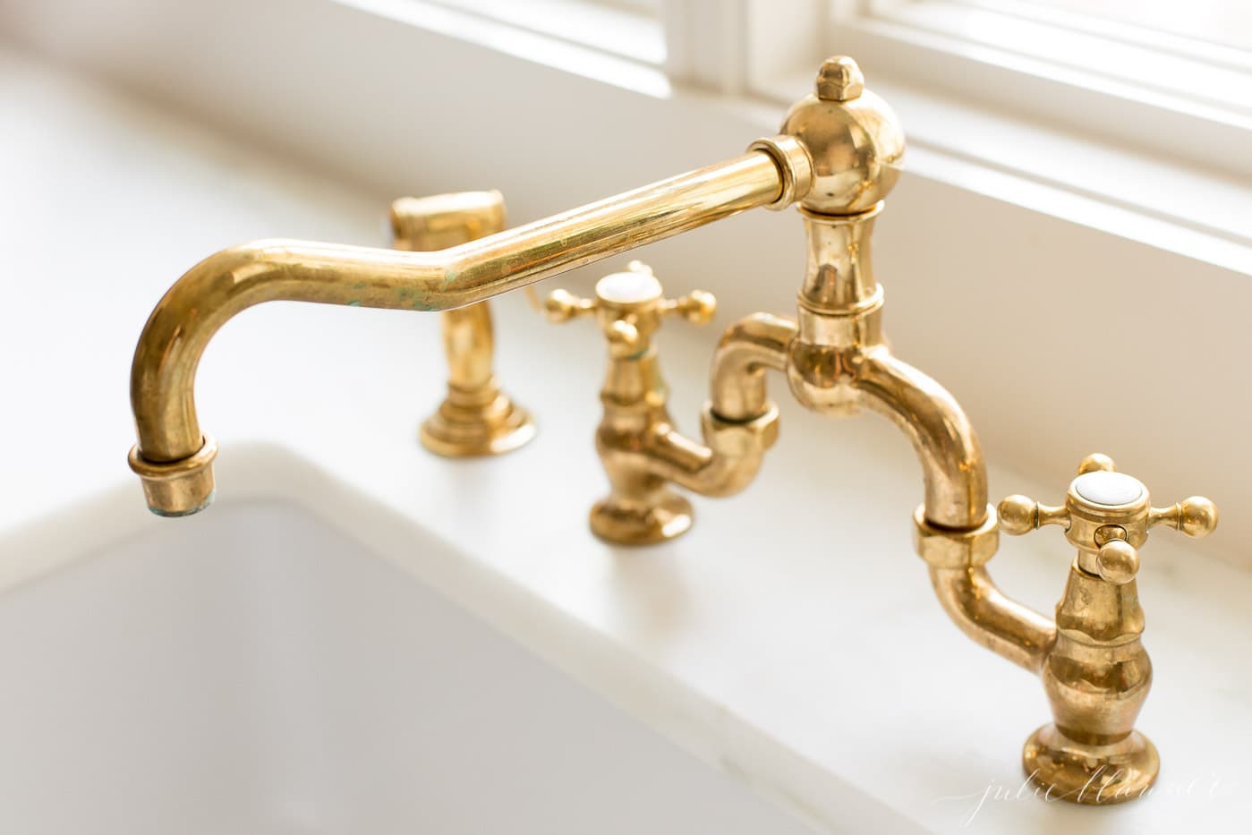 unlacquered brass wall mount kitchen faucet