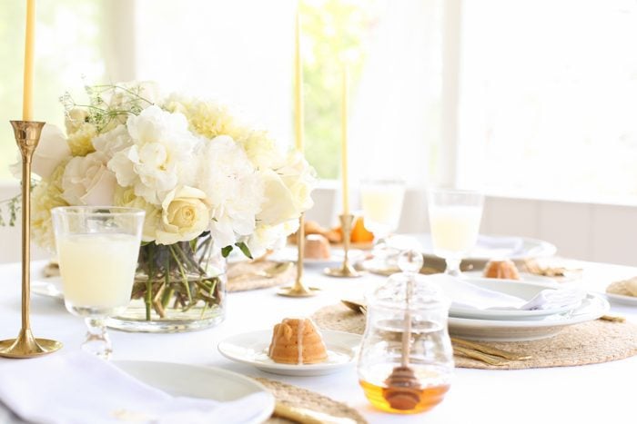 honey in honey jar on brunch table setting