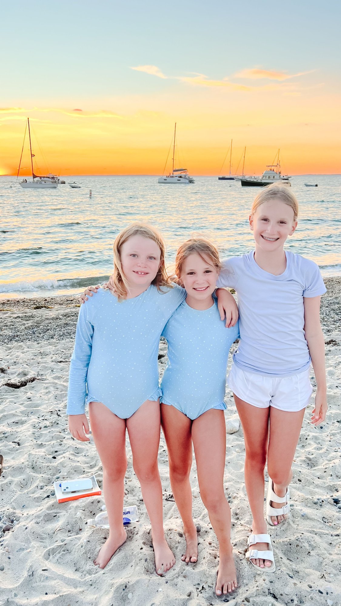 Three little girls on a beach in Martha's Vineyard