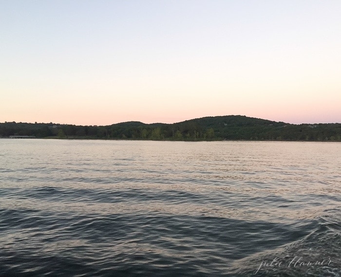 A lake and skyline at sunset