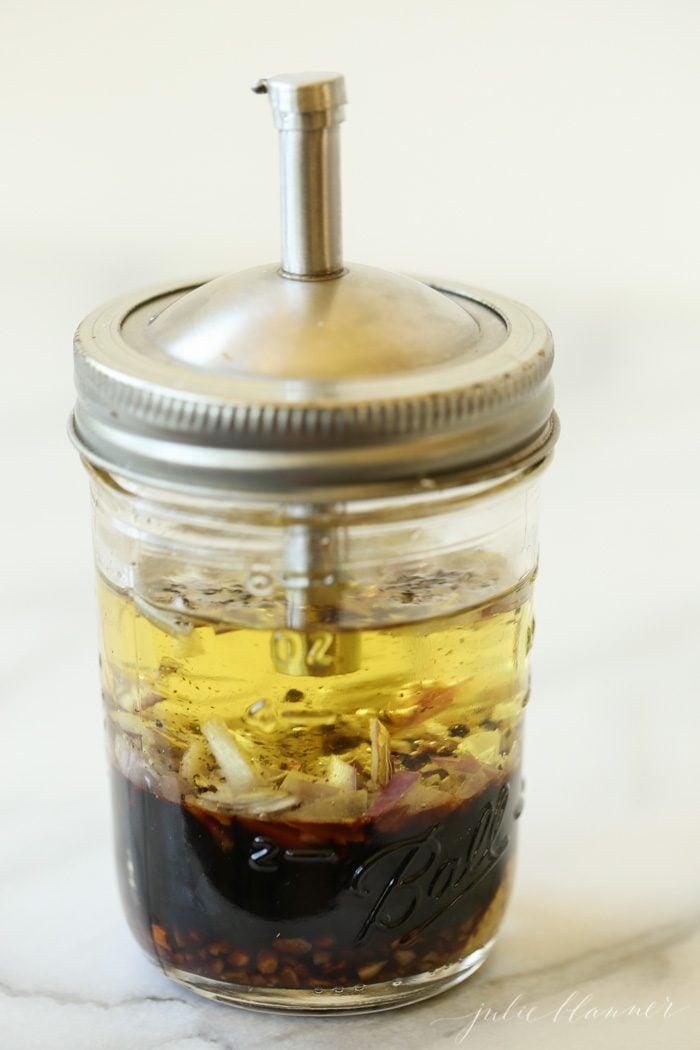 how to make balsamic vinaigrette - ingredients in mason jar with lid
