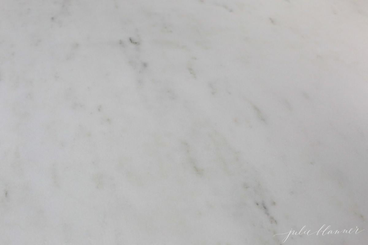 A close up of a marble countertop with an oil stain, after being sealed with DuPont StoneTech BulletProof Sealer.