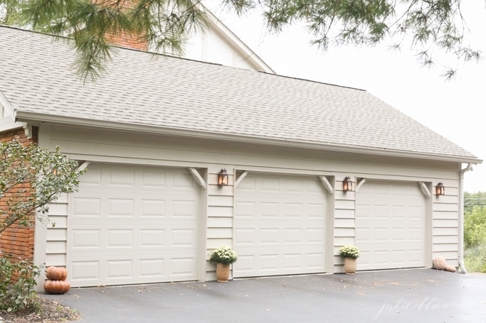 Garage with planters and pumpkins