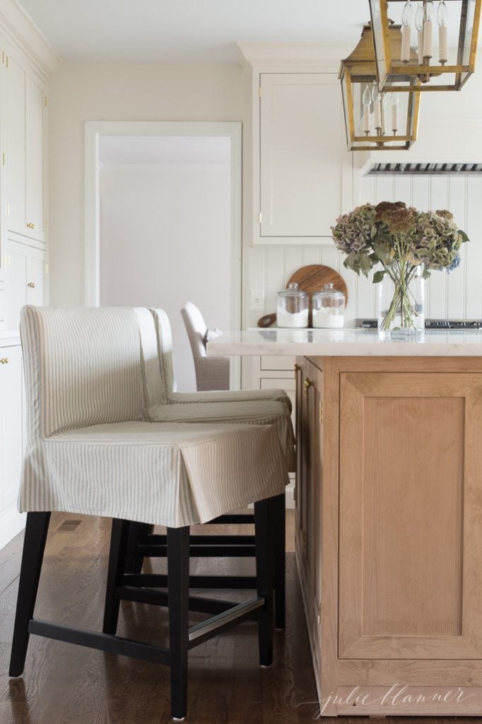 counter height stools from ikea with custom ticking stripe slipcovers