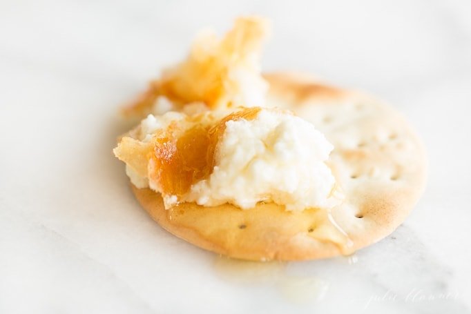Baked goats cheese on a cracker