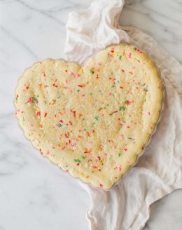 This easy birthday cake recipe feels festive without a lot of effort. Funfetti cookie cake is always a crowd pleaser and made with just staple ingredients!