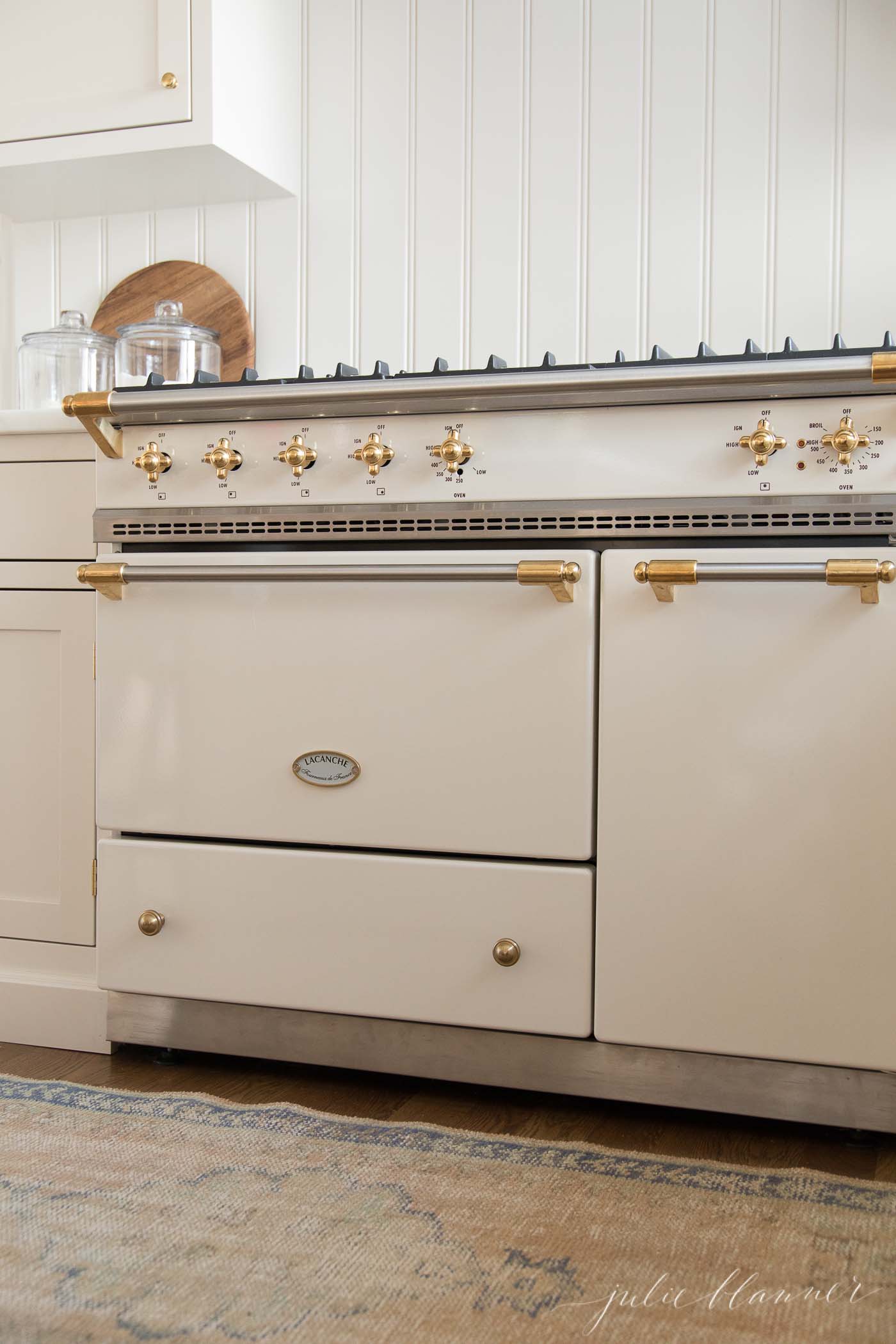 An ivory la canche french stove with brass hardware