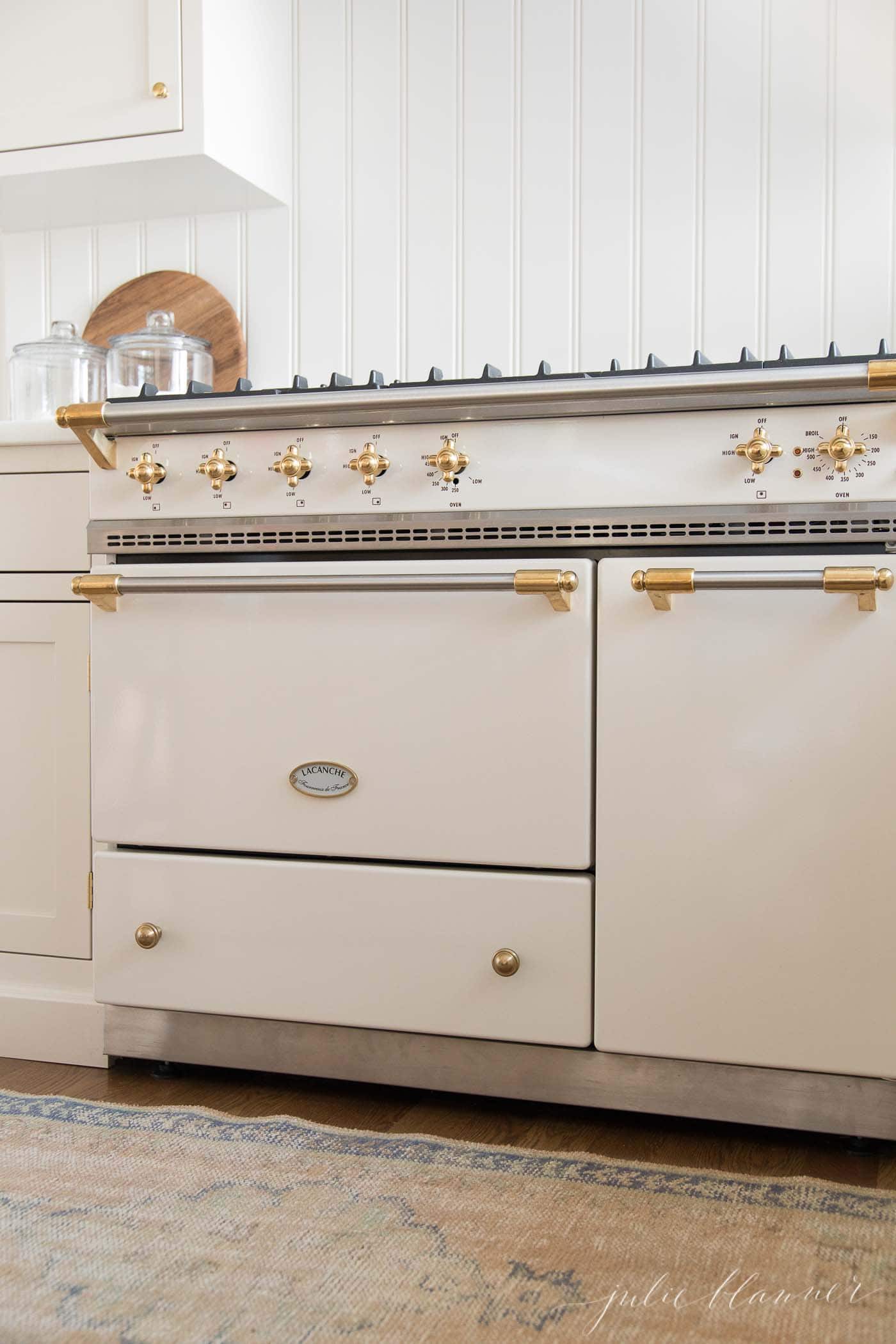 Stove and cooker red hot. Induction, ceramic cooktop, electric stovetop and  hob in kitchen. Warm plate ready for cooking. Contemporary interior design,  modern counter and wood table., Stock image