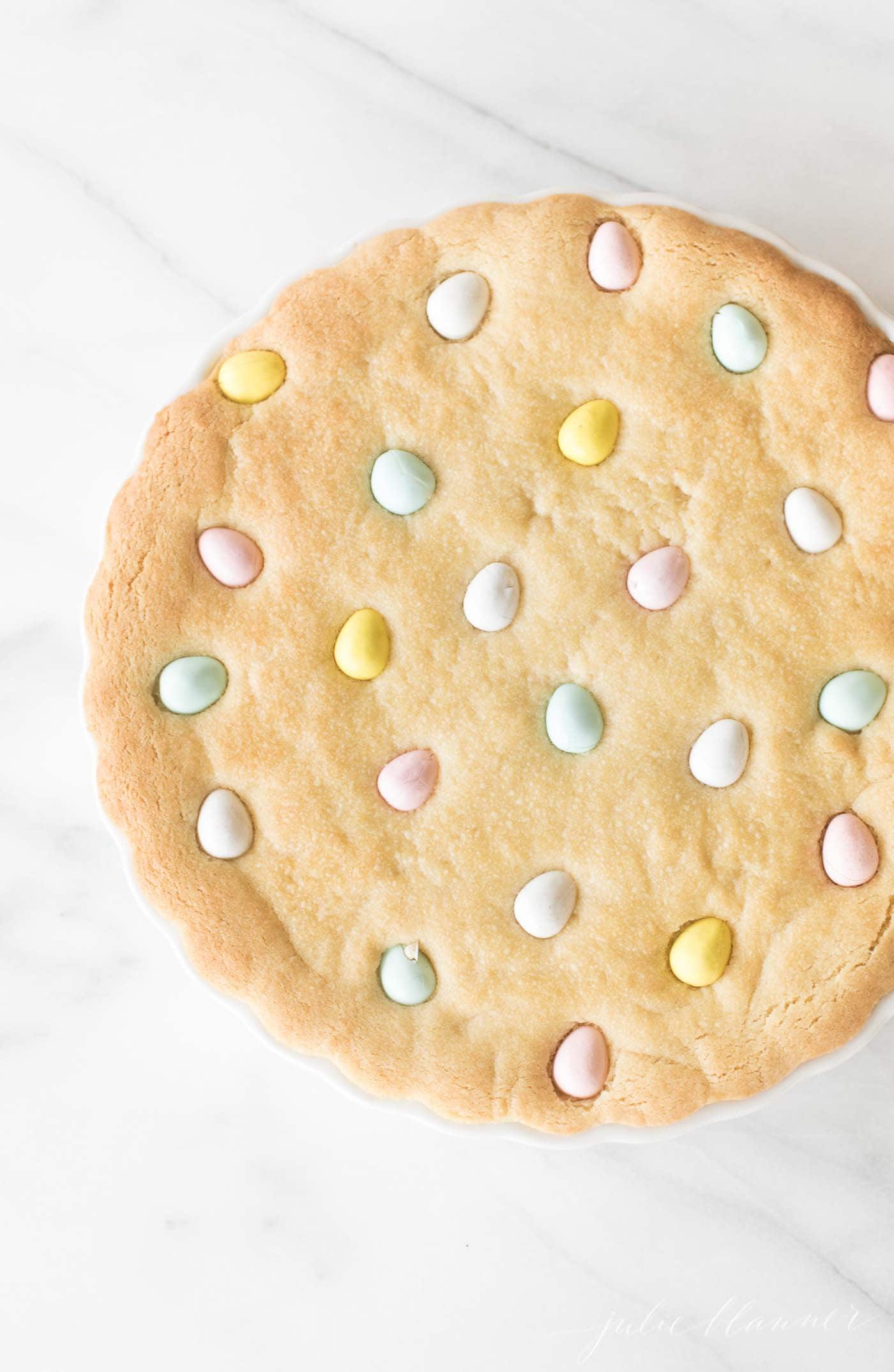 thick cookie cake with pastel eggs