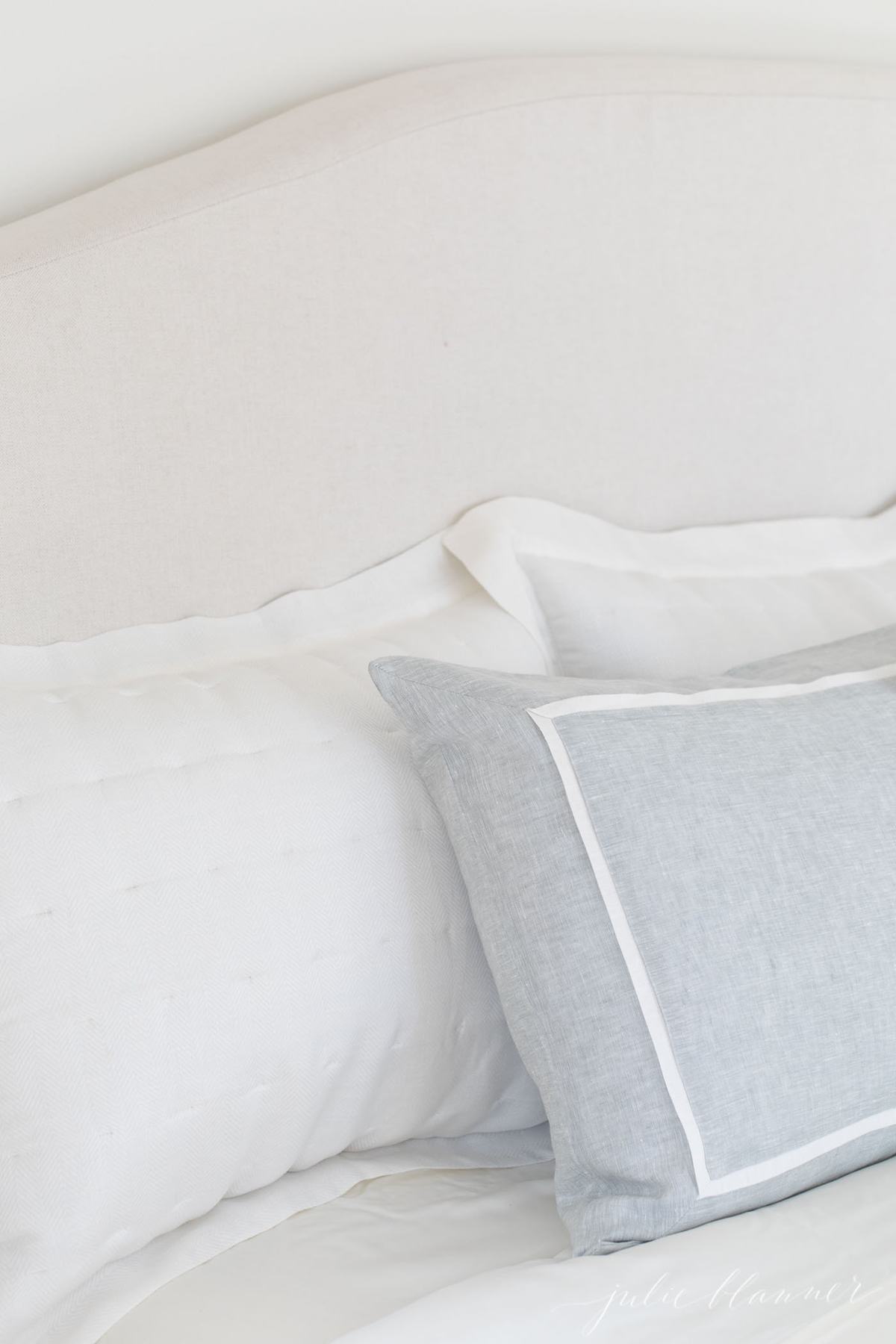 linen headboard and linen bedding