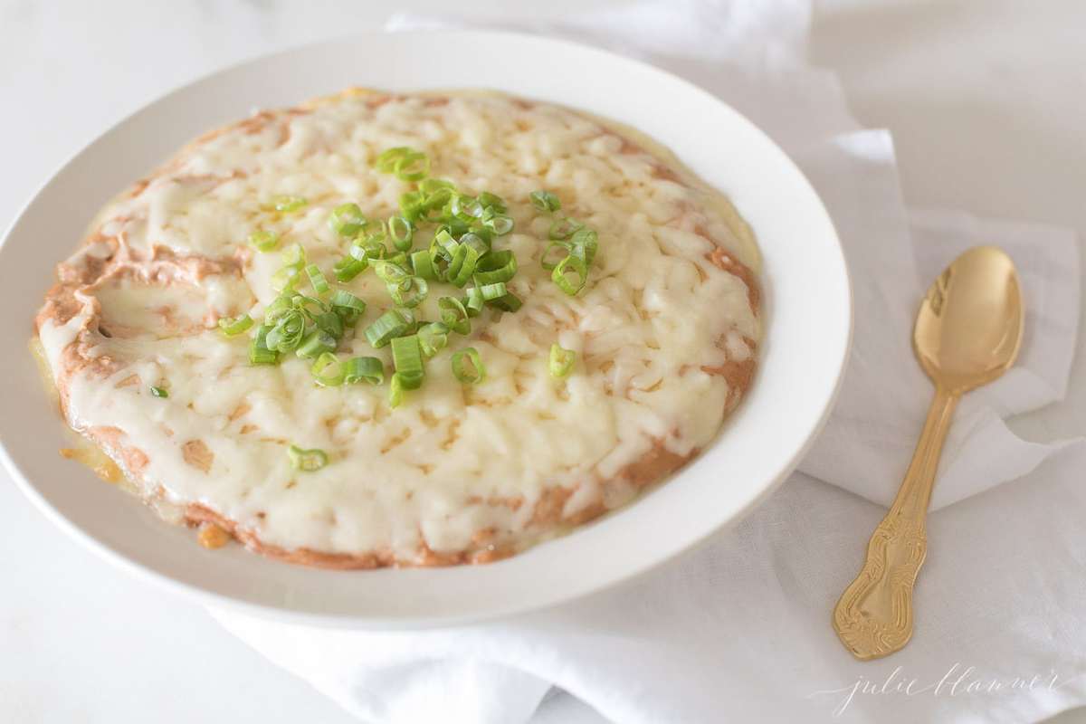 cream cheese bean dip in a white bowl