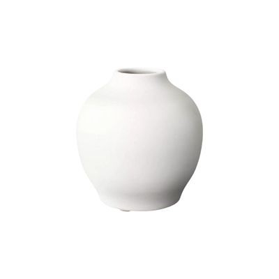 A white stoneware flower vase on a white background.