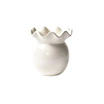 a mini ruffled white flower vase on a white background