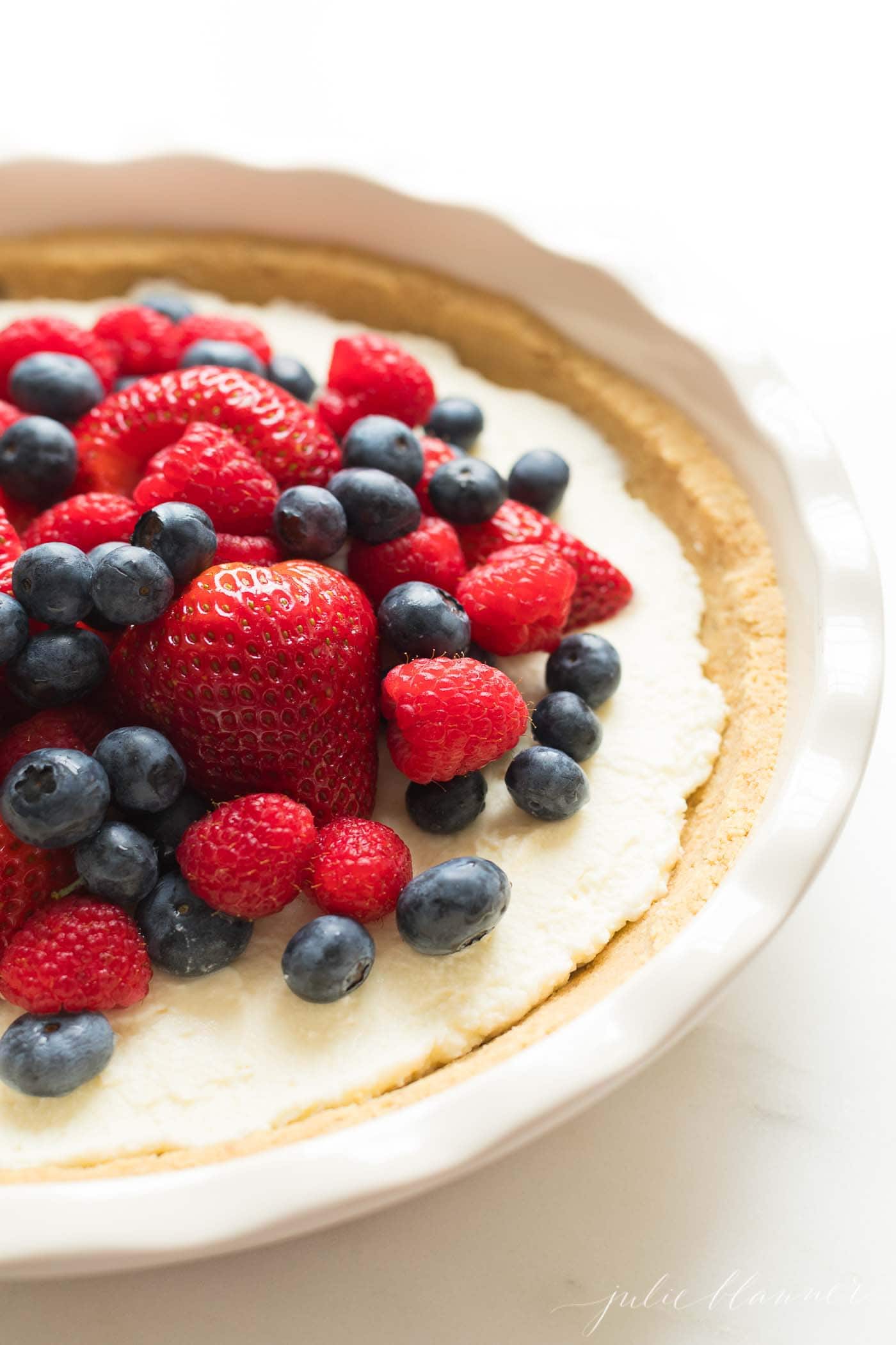 no bake lemon pie topped with berries