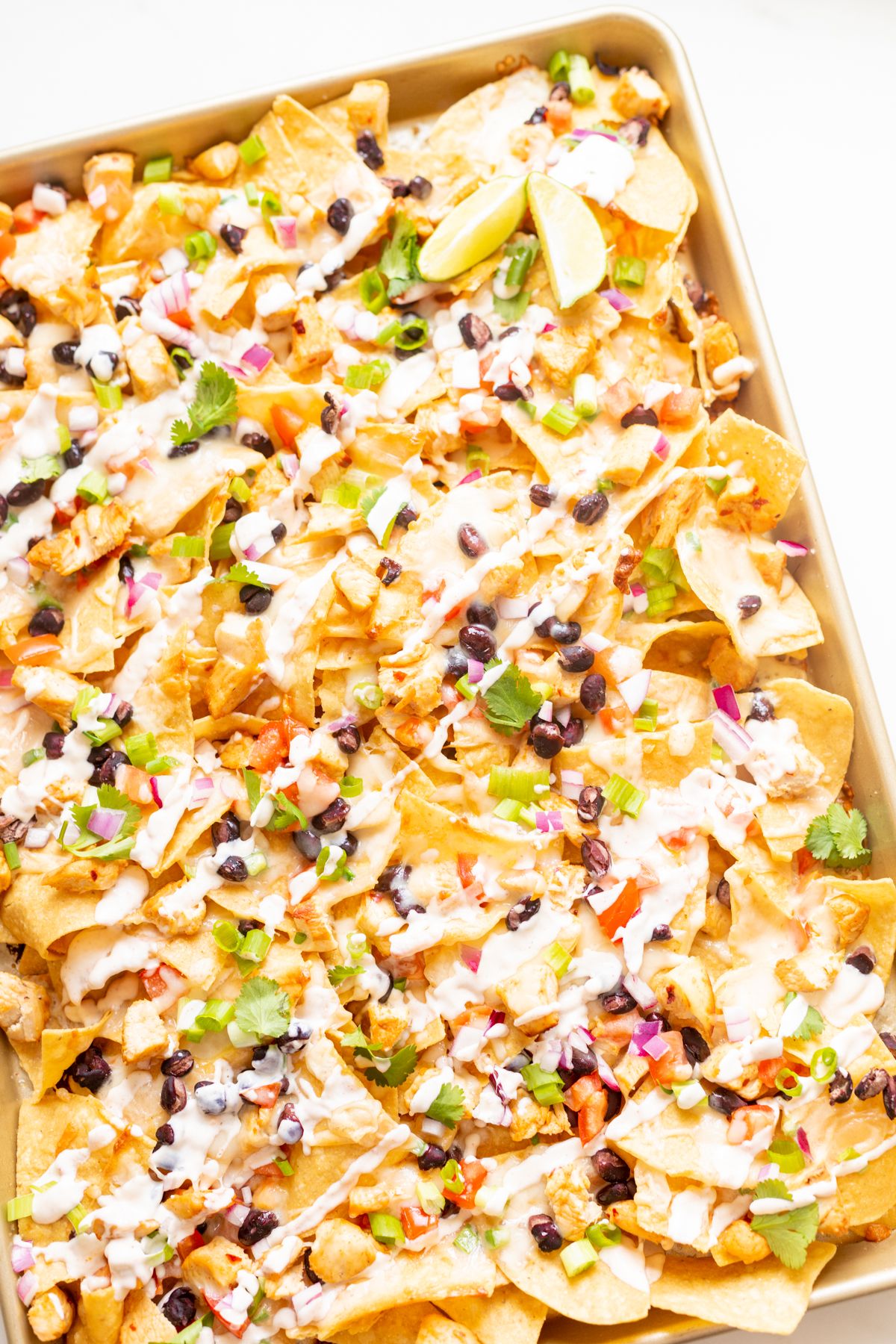 https://julieblanner.com/wp-content/uploads/2018/06/chicken-nachos-3.jpeg