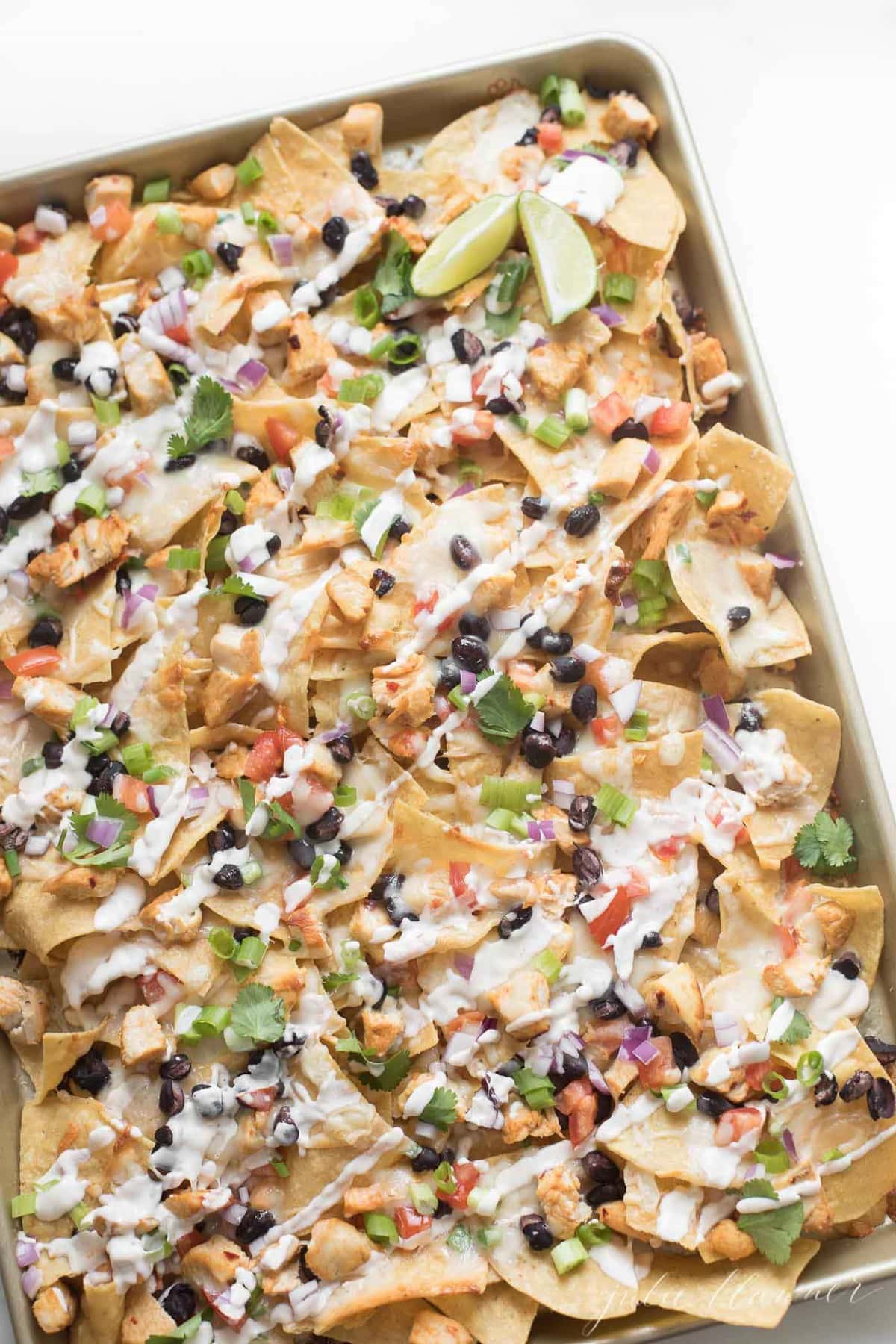 chicken nachos in a sheet pan