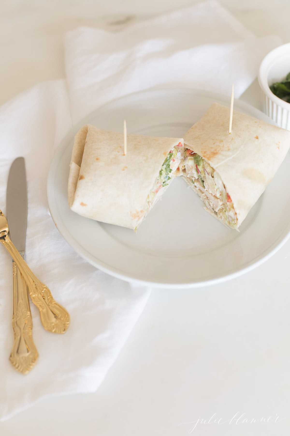 warp on a plate with napkin and utensils