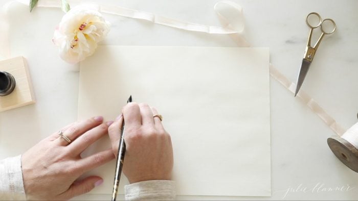 how to write calligraphy holding the pen