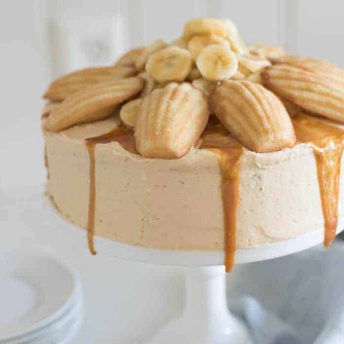 A banana cake topped with caramel frosting.