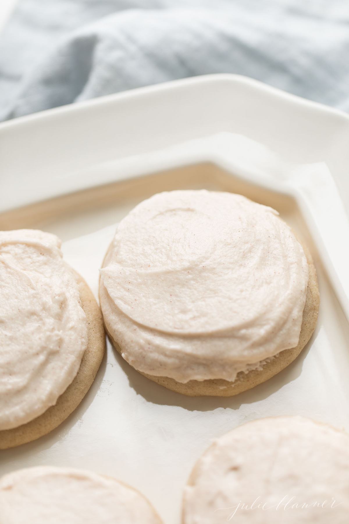 Four cinnamon frosted cookies