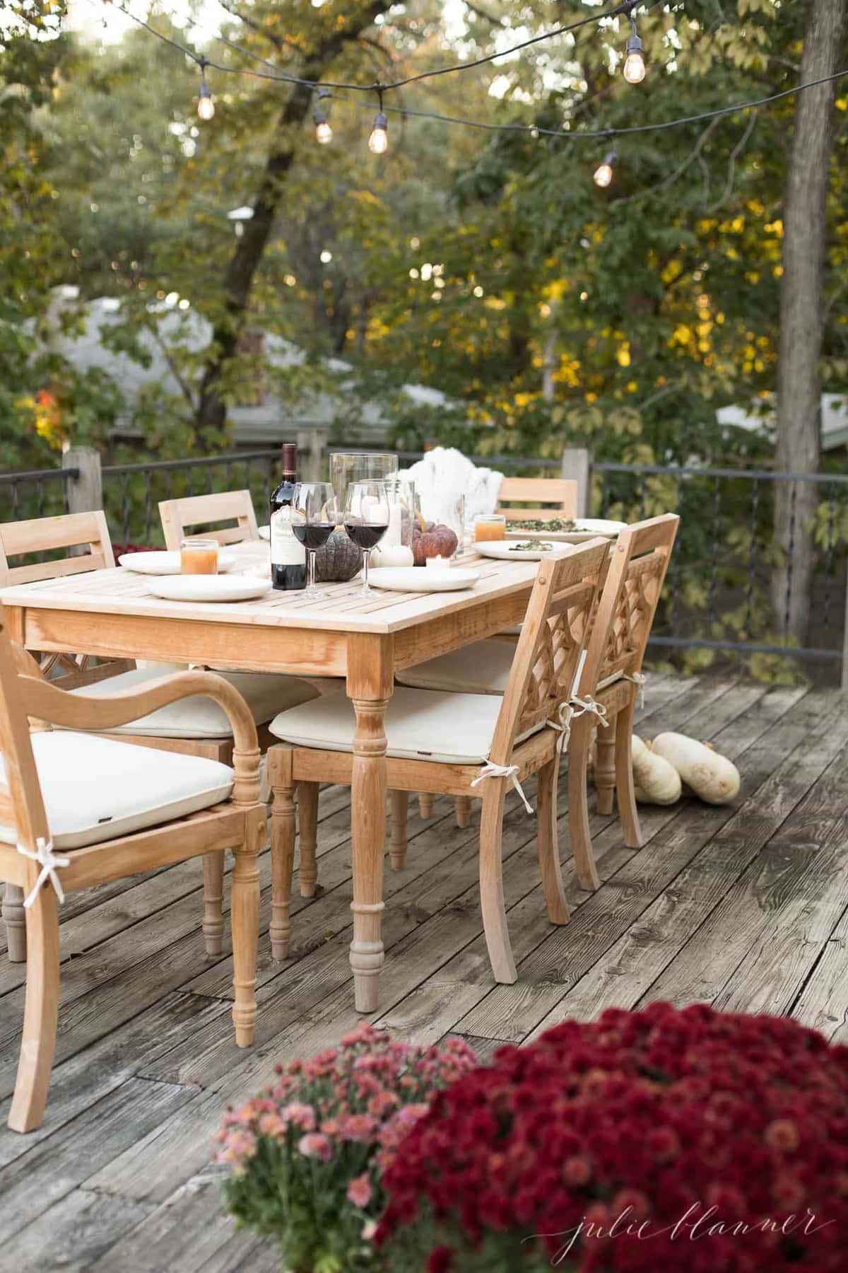 Add lights to a deck or patio to dine al fresco during the fall months