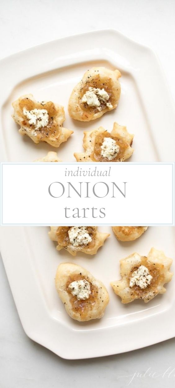 White serving platter of individual onion tarts