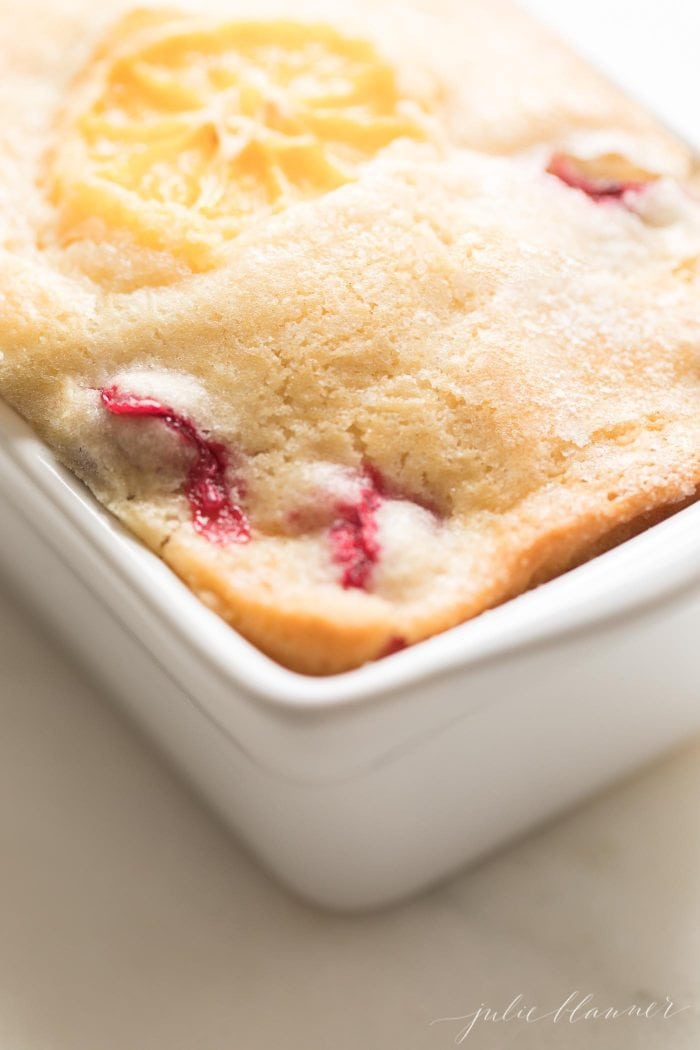 Easy Cranberry Bread recipe. Make 6 miniature giftable Christmas bread loaves in less than 10 minutes! #bread #christmas #christmasrecipe #easyrecipe Close up of the quick cranberry bread