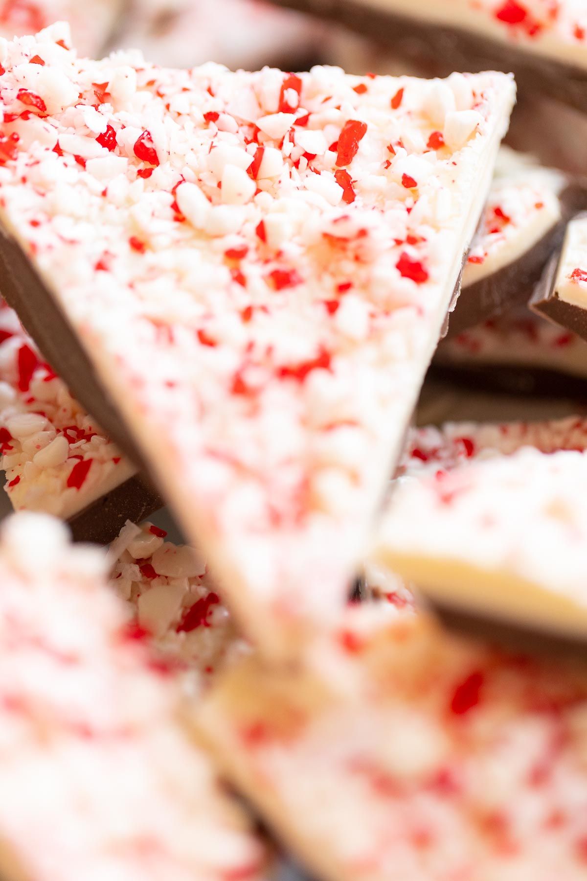 Triangle shaped servings of peppermint bark.