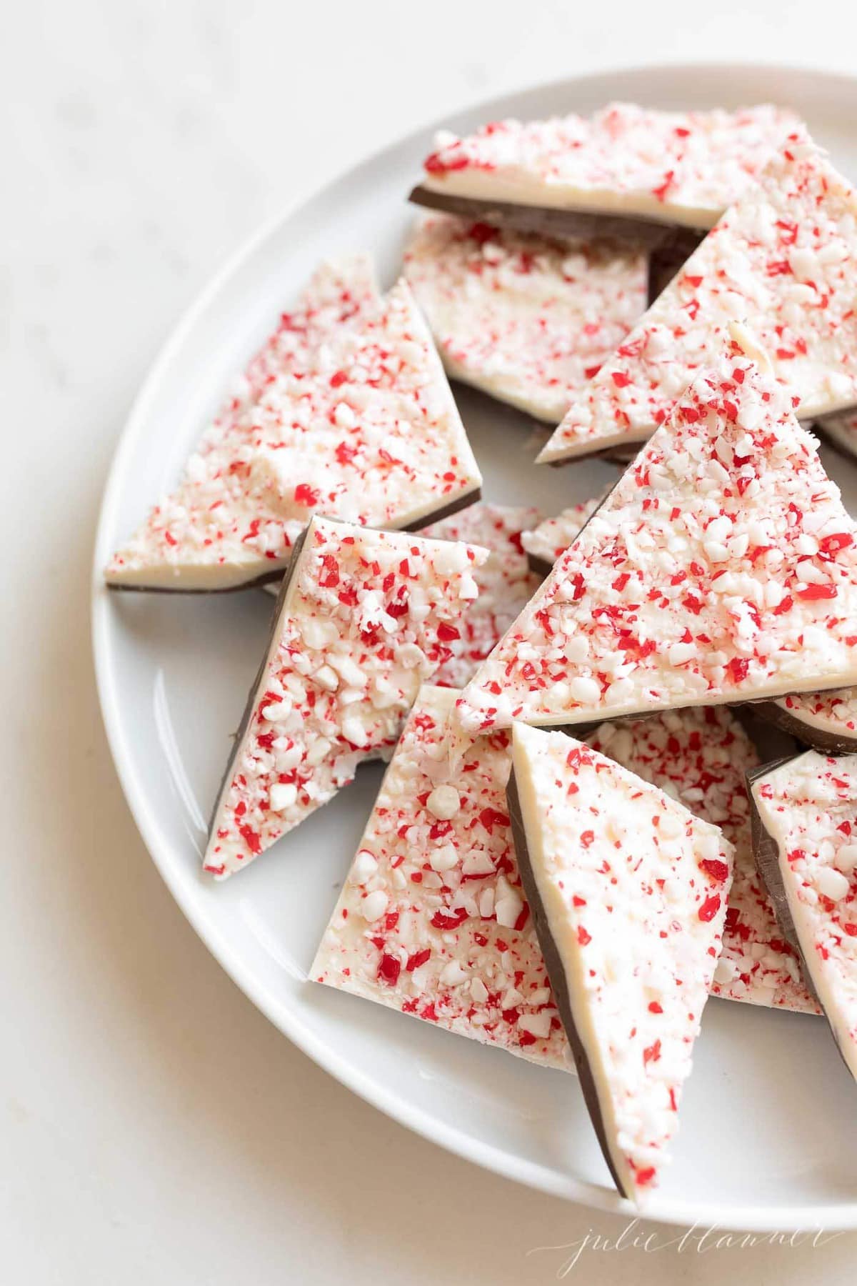 salted peppermint Christmas bark on a plate ready to eat
