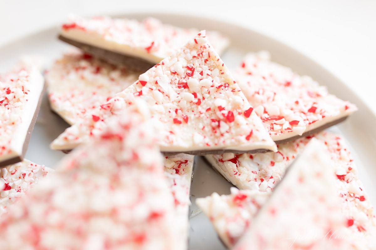 Pieces of salted peppermint bark on a white plate