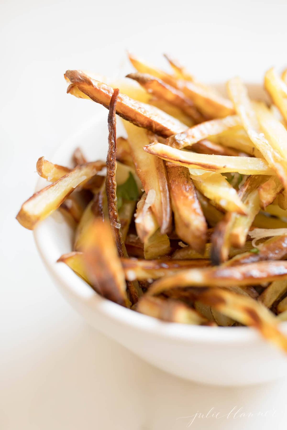 fries in a white bowl