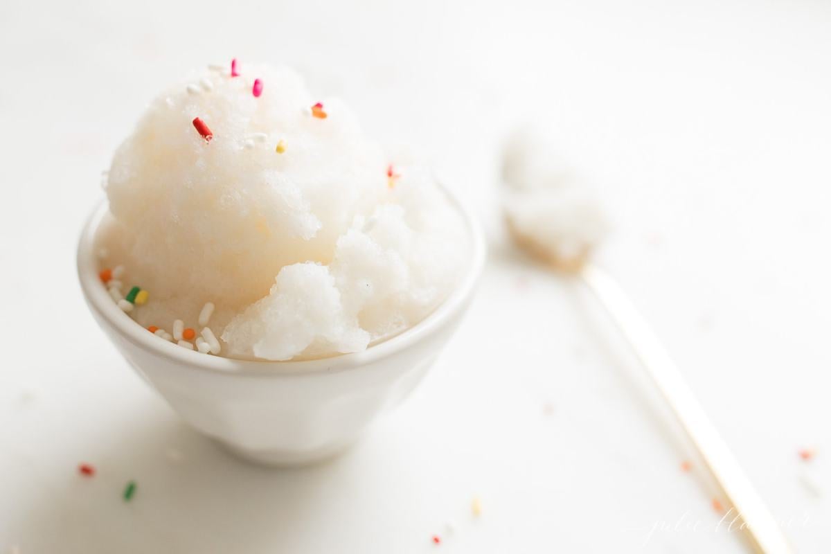 close up of snow ice cream in white bowl