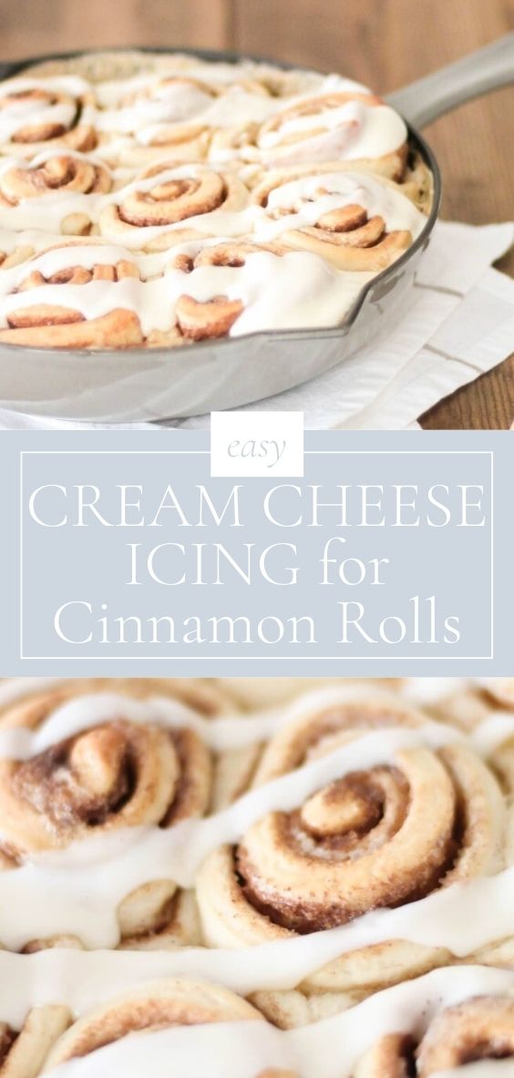 On a wooden table there is a skillet of cinnamon rolls covered in delicious, fast, and easy cream cheese icing.