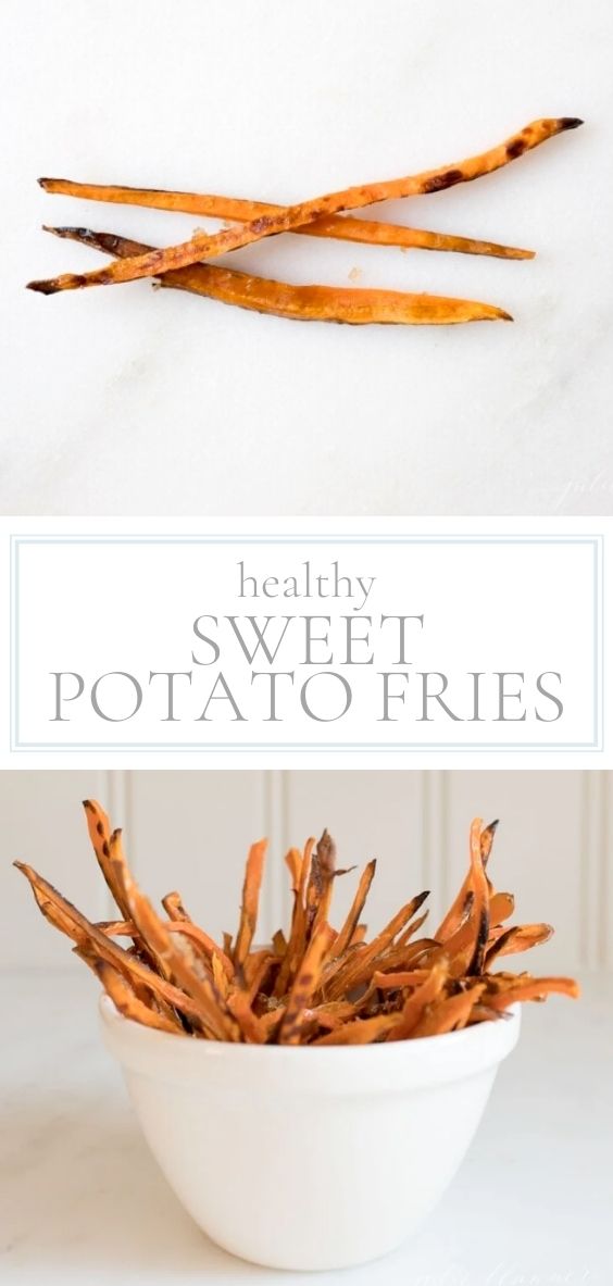 On a marble counter top, there is a white bowl of healthy sweet potato fries.