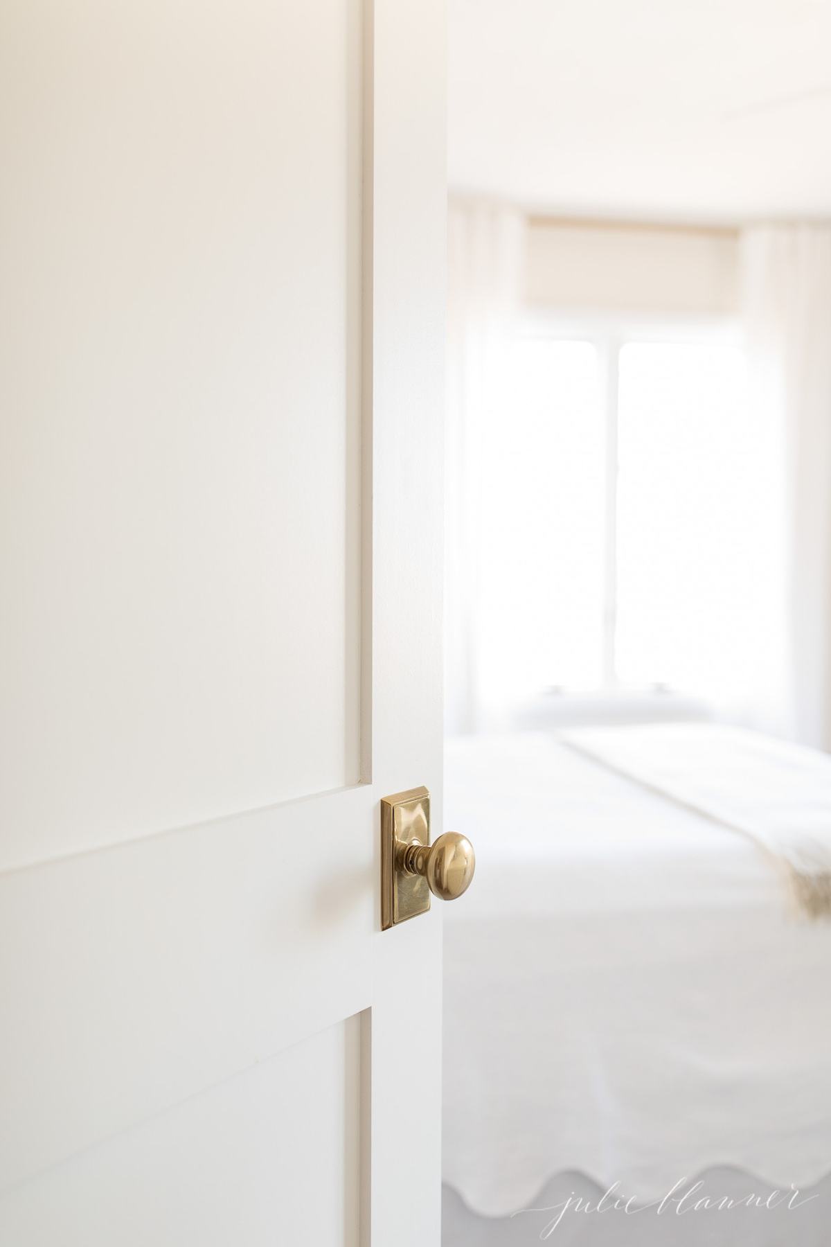 make the most of a small hallway with details like brass knobs