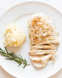 chicken with garlic sauce on a plate