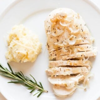 chicken with garlic sauce on a plate