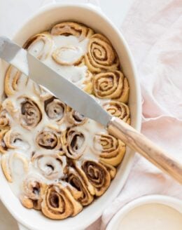 cinnamon roll icing on rolls