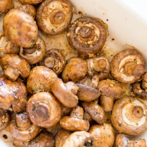 Oven Roasted Mushrooms in a white baking dish.